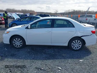 2012 Toyota Corolla L with VIN 2T1BU4EE3CC771071, listed as a IAAI auction lot 41887178 with 100,747 mi miles. Bid and sale history available at carsss.com. Image 14.