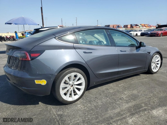 2022 Tesla Model 3 with VIN 5YJ3E1EA1NF372879, listed as a Copart auction lot 71604604 with 60,925 mi miles and Salvage Title. Bid and sale history available at carsss.com. Image 3.