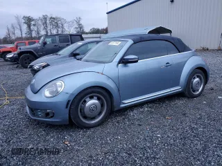 2016 Volkswagen Beetle S with VIN 3VW517AT2GM821898, listed as a Copart auction lot 81577194 with 154,284 mi miles and Salvage Title. Bid and sale history available at DreamBid. Image 1.