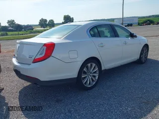 2013 Lincoln MKS EcoBoost with VIN 1LNHL9FT4DG614140, listed as a IAAI auction lot 42866991 with 126,487 mi miles and . Bid and sale history available at DreamBid. Image 4.