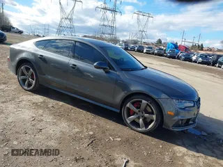 2018 Audi S7 Prestige with VIN WAU2FAFC6JN002741, listed as a IAAI auction lot 41457706 with 70,113 mi miles. Bid and sale history available at carsss.com. Image 1.
