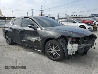 2022 Lexus ES 300h with VIN 58ADA1C17NU021831, listed as a Copart auction lot 52971935 with 73,056 mi miles and Salvage title. Bid and sale history available at DreamBid. Image 4.