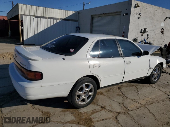 1992 Toyota Camry LE z VIN 4T1SK12E8NU044387, wystawiony jako Copart lot #43195915 z przebiegiem 279 199 mil mil oraz Szkoda całkowita • Salvage title. Historia ofert i sprzedaży dostępna na DreamBid. Obrazek 3.