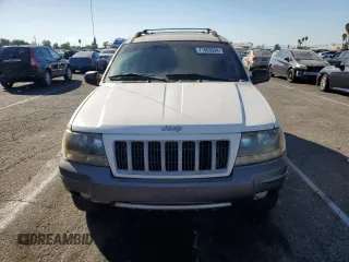 2004 Jeep Grand Cherokee with VIN 1J4GX48JX4C301369, listed as a Copart auction lot 77803094 with 179,404 mi miles and Clean title. Bid and sale history available at DreamBid. Image 5.