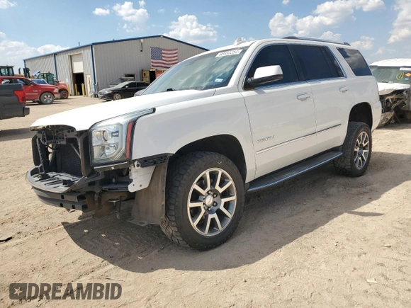 2016 GMC Yukon Denali with VIN 1GKS2CKJ5GR282446, listed as a Copart auction lot 68660254 with 122,751 mi miles and Salvage Title. Bid and sale history available at carsss.com. Image 1.