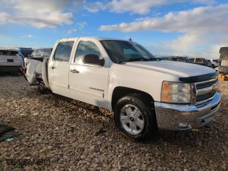 2012 Chevrolet Silverado 1500 LT with VIN 3GCPKSE75CG100265, listed as a Copart auction lot 83120224 with 143,807 mi miles and Salvage Title. Bid and sale history available at carsss.com. Image 4.
