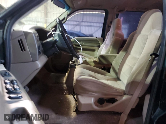 2002 Ford F-250 XL with VIN 1FTNW20F52EA52699, listed as a Copart auction lot 84088814 with 299,869 mi miles and Salvage Title. Bid and sale history available at DreamBid. Image 7.