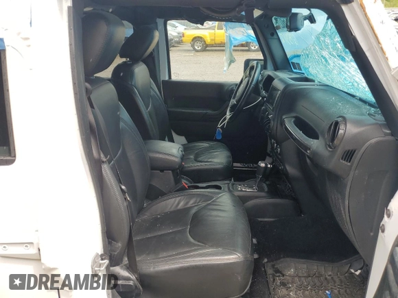 2017 Jeep Wrangler Unlimited 75th Anniversary with VIN 1C4BJWEG4HL675312, listed as a Copart auction lot 43602725 with 99,952 mi miles and Salvage title. Bid and sale history available at DreamBid. Image 7.