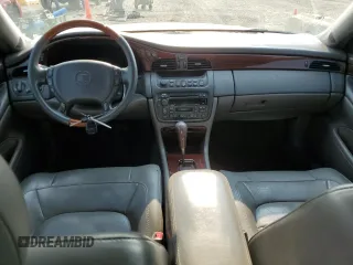 2004 Cadillac DeVille DTS z VIN 1G6KF57984U188454, wystawiony jako Copart lot #62397494 z przebiegiem 142 060 mil mil oraz Szkoda całkowita • Salvage title. Historia ofert i sprzedaży dostępna na DreamBid. Obrazek 8.