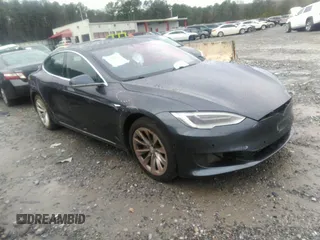 2016 Tesla Model S 70 kWh Battery with VIN 5YJSA1E13GF174542, listed as a IAAI auction lot 41169279 with 72,691 mi miles. Bid and sale history available at carsss.com. Image 1.