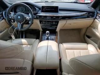 2015 BMW X5 xDrive50i z VIN 5UXKR6C5XF0J77462, wystawiony jako Copart lot #58912895 z przebiegiem 100 086 mil mil oraz Czysty tytuł • Clean title. Historia ofert i sprzedaży dostępna na DreamBid. Obrazek 8.