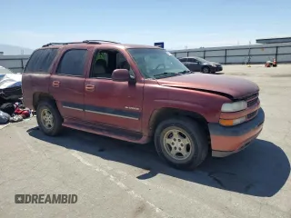 2001 Chevrolet Tahoe LT with VIN 1GNEC13T71R164164, listed as a Copart auction lot 60066165 with 234,506 mi miles and Salvage title. Bid and sale history available at DreamBid. Image 4.