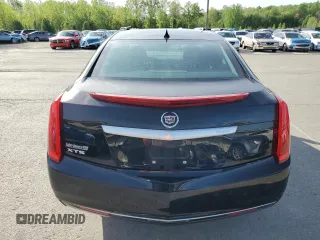 2014 Cadillac XTS z VIN 2G61L5S39E9298743, wystawiony jako Copart lot #53640375 z przebiegiem 77 382 mil mil oraz Szkody całkowita. Historia ofert i sprzedaży dostępna na DreamBid. Obrazek 6.