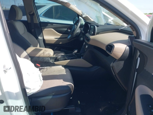 2019 Hyundai Santa Fe SE with VIN 5NMS23AD8KH051223, listed as a IAAI auction lot 42017754 with 146,704 mi miles and . Bid and sale history available at DreamBid. Image 5.