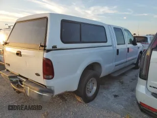 2000 Ford F-350 XL with VIN 1FTSW30S6YEC82315, listed as a Copart auction lot 75479334 with 327,345 mi miles and Salvage Title. Bid and sale history available at DreamBid. Image 3.