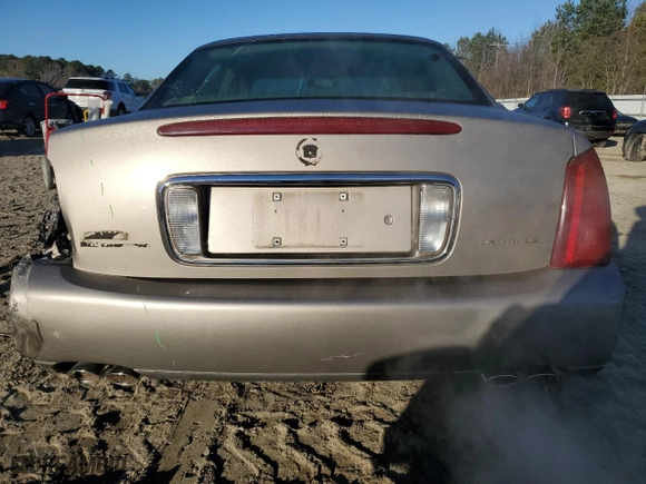 2000 Cadillac DeVille with VIN 1G6KD54Y1YU254446, listed as a Copart auction lot 86761204 with 48,272 mi miles and Salvage Title. Bid and sale history available at carsss.com. Image 6.