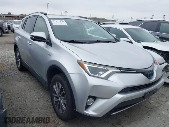 2016 Toyota RAV4 Hybrid XLE with VIN JTMRJREVXGD029019, listed as a IAAI auction lot 42021530 with 74,400 mi miles. Bid and sale history available at carsss.com. Image 1.