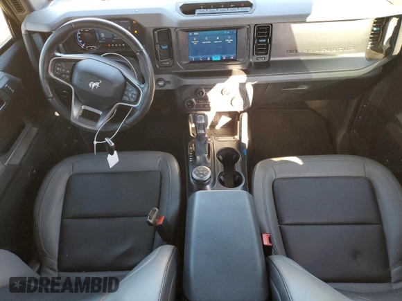 2021 Ford Bronco with VIN 1FMEE5DH0MLA77066, listed as a Copart auction lot 87551145 with 62,610 mi miles and Salvage title. Bid and sale history available at DreamBid. Image 8.