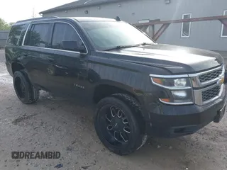 2018 Chevrolet Tahoe LS z VIN 1GNSKAKC4JR127872, wystawiony jako IAAI lot #42197547 z przebiegiem 127 875 mil mil oraz . Historia ofert i sprzedaży dostępna na DreamBid. Obrazek 1.
