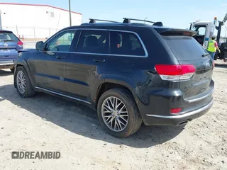 2018 Jeep Grand Cherokee Summit with VIN 1C4RJEJG2JC392847, listed as a IAAI auction lot 41751452 with 136,793 mi miles and . Bid and sale history available at DreamBid. Image 3.