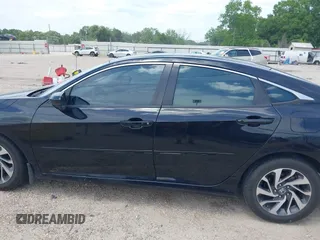 2016 Honda Civic EX with VIN 19XFC2F76GE076101, listed as a IAAI auction lot 42138596 with 135,351 mi miles and . Bid and sale history available at DreamBid. Image 14.