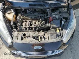 2015 Ford Fiesta SE z VIN 3FADP4BJXFM146122, wystawiony jako Copart lot #59998625 z przebiegiem 114 191 mil mil oraz Czysty tytuł • Clean title. Historia ofert i sprzedaży dostępna na DreamBid. Obrazek 11.