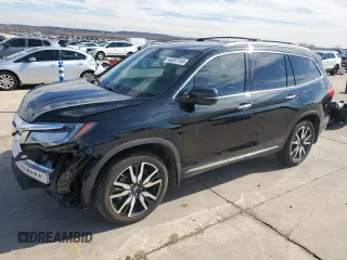 2022 Honda Pilot Touring 7-Passenger z VIN 5FNYF5H64NB003094, wystawiony jako Copart lot #43207155 z przebiegiem 34 394 mil mil oraz Szkoda całkowita • Salvage title. Historia ofert i sprzedaży dostępna na DreamBid. Obrazek 1.