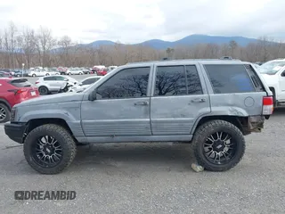 1995 Jeep Grand Cherokee Laredo with VIN 1J4GZ58S4SC778322, listed as a IAAI auction lot 41498800 with 255,058 mi miles. Bid and sale history available at carsss.com. Image 15.