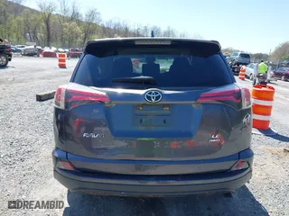 2018 Toyota RAV4 LE with VIN JTMBFREV0JJ722483, listed as a IAAI auction lot 41982973 with 83,012 mi miles. Bid and sale history available at carsss.com. Image 16.