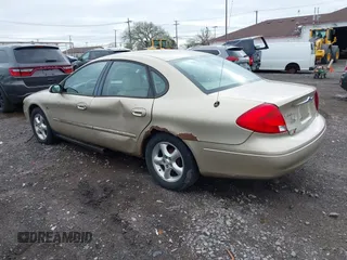 2001 Ford Taurus SES with VIN 1FAFP55S01A155758, listed as a IAAI auction lot 42152091 with 74,817 mi miles. Bid and sale history available at carsss.com. Image 3.