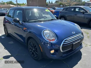 2015 MINI Hardtop 4 Door with VIN WMWXS5C5XFT831166, listed as a Copart auction lot 56714285 with 69,668 mi miles and Salvage Title. Bid and sale history available at DreamBid. Image 1.