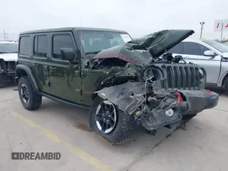 2021 Jeep Wrangler Unlimited Rubicon with VIN 1C4HJXFGXMW624629, listed as a IAAI auction lot 41278318 with 5,714 mi miles. Bid and sale history available at carsss.com. Image 1.