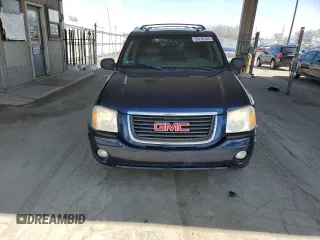 2004 GMC Envoy SLE with VIN 1GKDT13S142201271, listed as a Copart auction lot 50249705 with 248,364 mi miles and Salvage Title. Bid and sale history available at carsss.com. Image 5.