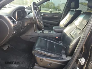 2015 Jeep Grand Cherokee High Altitude with VIN 1C4RJFCG8FC878265, listed as a Copart auction lot 55044325 with 157,829 mi miles and Salvage title. Bid and sale history available at DreamBid. Image 7.