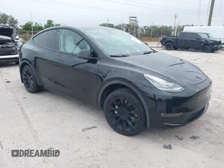 2021 Tesla Model Y Standard Range with VIN 5YJYGDED8MF123246, listed as a IAAI auction lot 41291676 with 74,630 mi miles and . Bid and sale history available at DreamBid. Image 1.