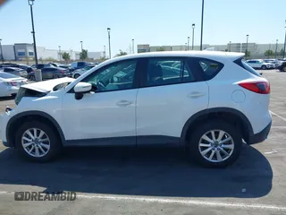 2016 Mazda CX-5 Sport with VIN JM3KE2BY9G0825285, listed as a IAAI auction lot 41841833 with 96,915 mi miles. Bid and sale history available at carsss.com. Image 14.