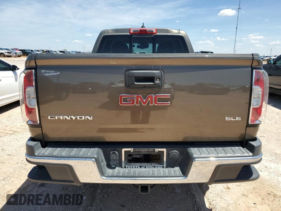2016 GMC Canyon 2WD SLE with VIN 1GTG5CE38G1110481, listed as a Copart auction lot 65950874 with 82,335 mi miles and Salvage Title. Bid and sale history available at carsss.com. Image 6.