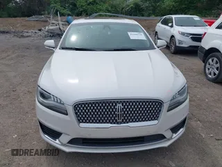 2019 Lincoln MKZ Hybrid Reserve II z VIN 3LN6L5MUXKR632126, wystawiony jako IAAI lot #42186526 z przebiegiem 130 364 mil mil oraz . Historia ofert i sprzedaży dostępna na DreamBid. Obrazek 12.