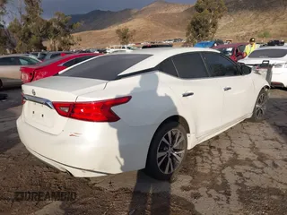 2017 Nissan Maxima SV with VIN 1N4AA6AP1HC368591, listed as a IAAI auction lot 41521808 with 154,214 mi miles and . Bid and sale history available at DreamBid. Image 4.