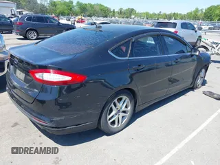 2015 Ford Fusion SE with VIN 3FA6P0H71FR258615, listed as a IAAI auction lot 41994439 with 185,410 mi miles and . Bid and sale history available at carsss.com. Image 4.