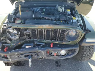 2024 Jeep Wrangler Rubicon z VIN 1C4PJXFG8RW226581, wystawiony jako Copart lot #55681685 z przebiegiem 17 738 mil mil oraz Szkoda całkowita • Salvage title. Historia ofert i sprzedaży dostępna na DreamBid. Obrazek 12.