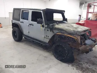 2009 Jeep Wrangler Unlimited X with VIN 1J4GA39159L763484, listed as a IAAI auction lot 40761006 with 1 mi miles. Bid and sale history available at carsss.com. Image 1.