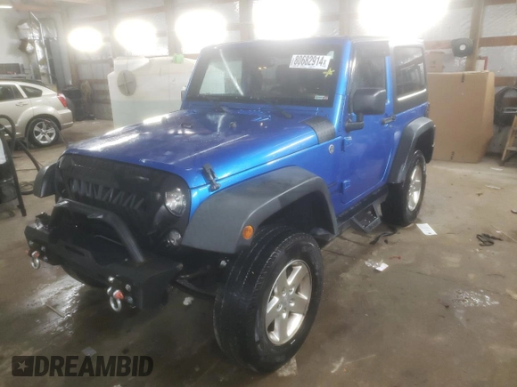 2015 Jeep Wrangler Willys Wheeler with VIN 1C4AJWAG2FL568130, listed as a Copart auction lot 80682914 with 111,686 mi miles and Salvage title. Bid and sale history available at DreamBid. Image 1.