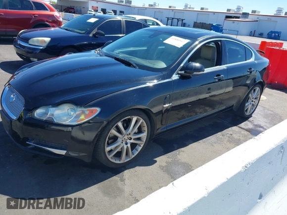 2010 Jaguar XF Premium Luxury with VIN SAJWA0GB3ALR49414, listed as a IAAI auction lot 41880567 with 132,230 mi miles. Bid and sale history available at carsss.com. Image 2.
