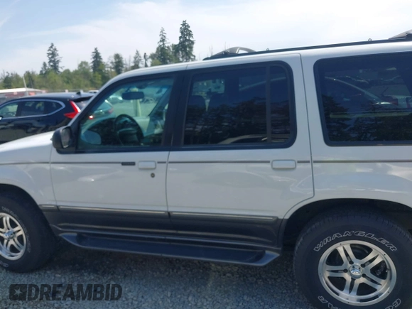 1998 Ford Explorer XL z VIN 1FMZU34E3WZA90831, wystawiony jako IAAI lot #42500120 z przebiegiem 97 799 mil mil oraz . Historia ofert i sprzedaży dostępna na DreamBid. Obrazek 13.