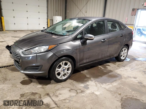 2015 Ford Fiesta SE with VIN 3FADP4BJ5FM123167, listed as a Copart auction lot 52576405 with 104,243 mi miles and Salvage Title. Bid and sale history available at DreamBid. Image 1.