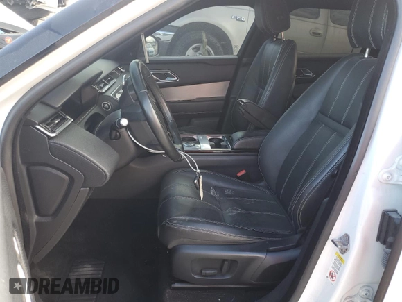 2019 Land Rover Range Rover Velar R-Dynamic SE с VIN SALYL2FV4KA207666, выставлен на аукционе Copart как лот 86477344 с пробегом 81 632 миль миль и На запчасти • Non repairable. История ставок и продаж доступна на DreamBid. Изображение 7.