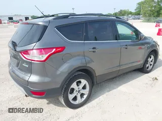 2013 Ford Escape SE z VIN 1FMCU0GX9DUC42459, wystawiony jako IAAI lot #42526275 z przebiegiem 203 310 mil mil oraz . Historia ofert i sprzedaży dostępna na DreamBid. Obrazek 4.
