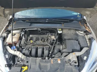 2017 Ford Focus SE z VIN 1FADP3F2XHL335127, wystawiony jako Copart lot #56119005 z przebiegiem 58 272 mil mil oraz Szkoda całkowita • Salvage title. Historia ofert i sprzedaży dostępna na DreamBid. Obrazek 11.