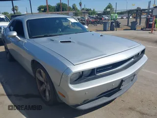 2012 Dodge Challenger R/T z VIN 2C3CDYBT4CH269081, wystawiony jako IAAI lot #42299521 z przebiegiem 106 915 mil mil oraz . Historia ofert i sprzedaży dostępna na DreamBid. Obrazek 1.